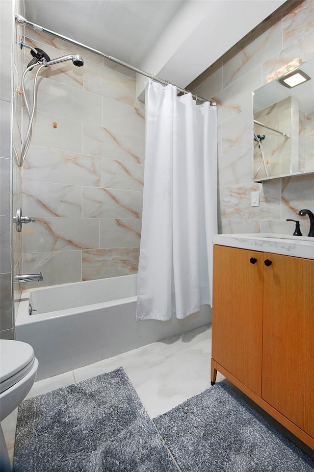 bathroom with vanity, toilet, and shower / tub combo