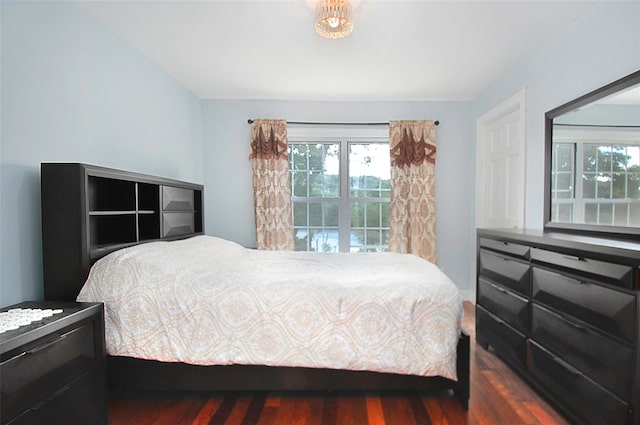 bedroom with wood finished floors