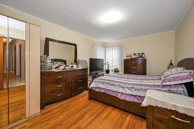 bedroom with light wood-style flooring