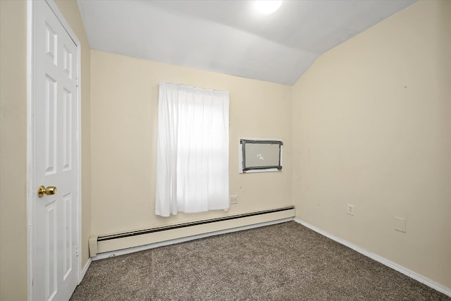 spare room with lofted ceiling, carpet flooring, baseboards, and a baseboard radiator