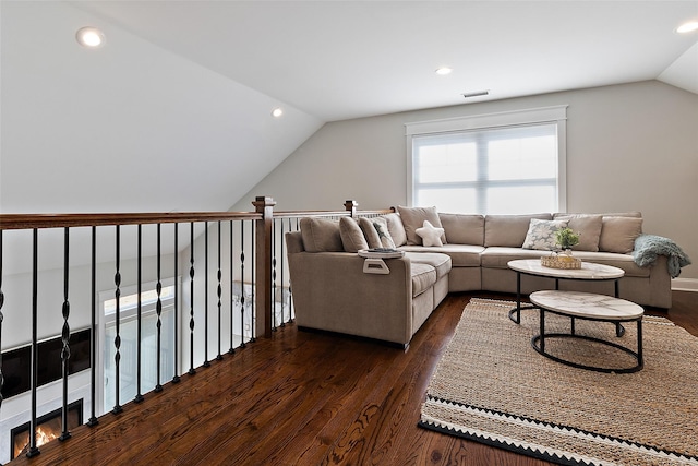 living room featuring recessed lighting, visible vents, lofted ceiling, and dark wood finished floors