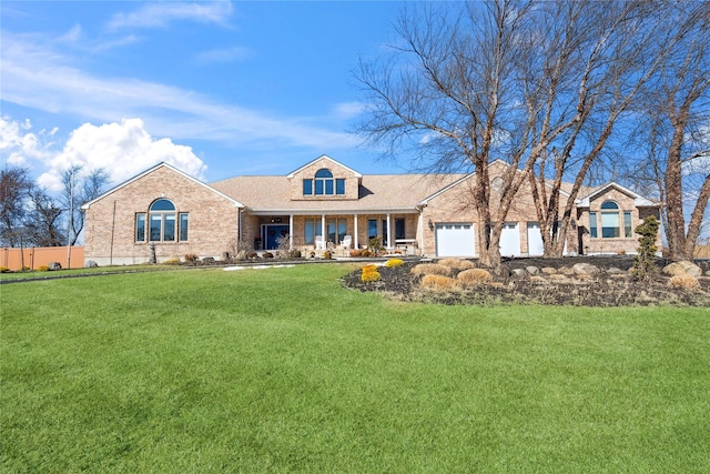 view of front of home featuring a front yard, fence, covered porch, a garage, and brick siding