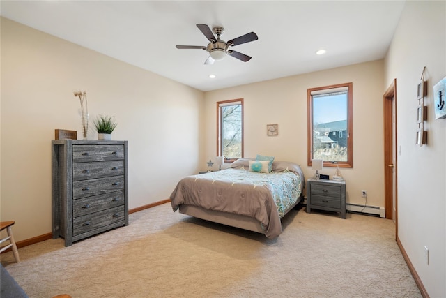 bedroom with light carpet, recessed lighting, a baseboard radiator, baseboards, and ceiling fan