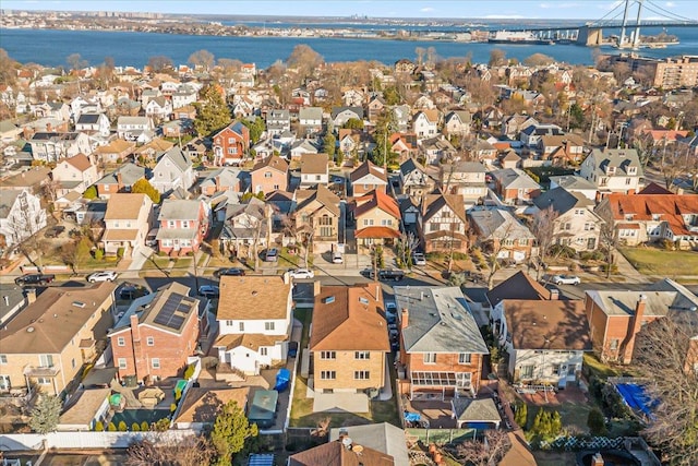 birds eye view of property featuring a residential view and a water view