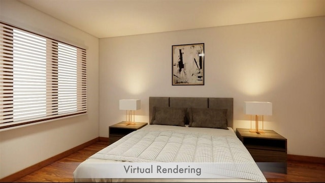 bedroom with wood finished floors and baseboards