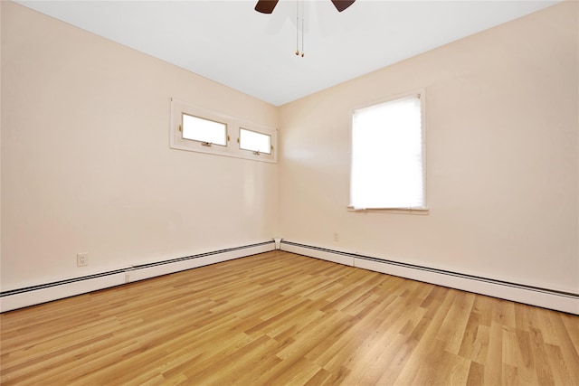 empty room with light wood-style flooring and a ceiling fan