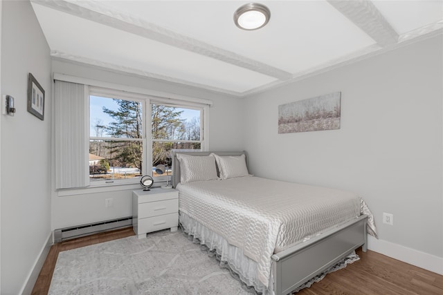 38 Marjorie Dr, Monticello, NY 12701 - bedroom featuring a baseboard radiator, baseboards, and light wood-style flooring