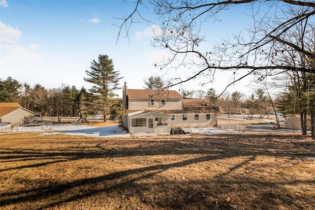 38 Marjorie Dr, Monticello, NY 12701 - back of property featuring a patio and a lawn