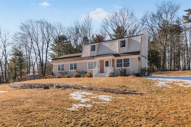 38 Marjorie Dr, Monticello, NY 12701 - view of front of home featuring a gambrel roof and a chimney