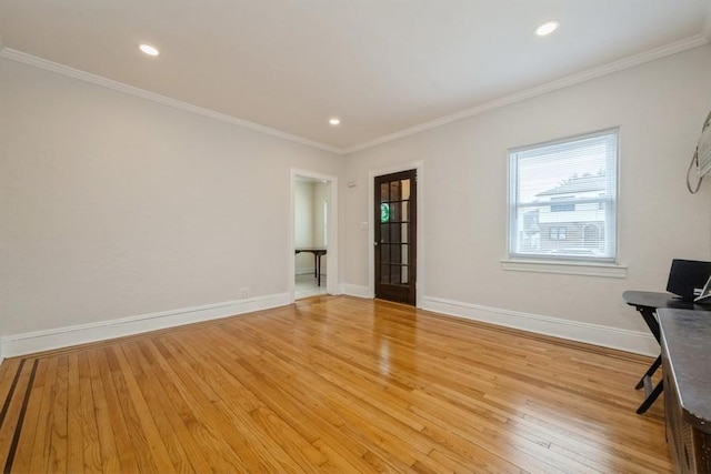 unfurnished office with recessed lighting, baseboards, light wood-style flooring, and ornamental molding