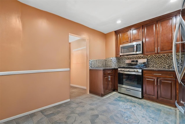 kitchen with decorative backsplash, recessed lighting, appliances with stainless steel finishes, and baseboards