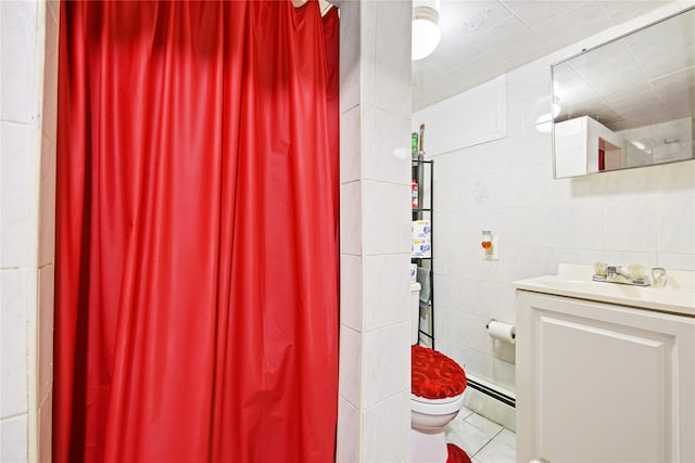 bathroom with a baseboard heating unit, tile walls, toilet, and vanity