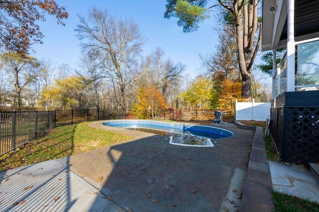 view of yard with a patio area, a fenced in pool, and a fenced backyard