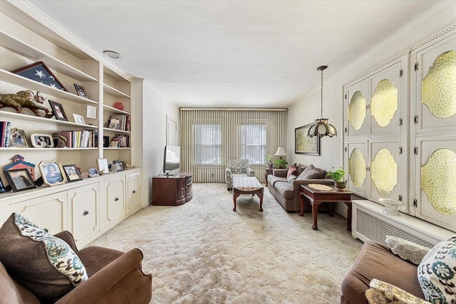 living area featuring light colored carpet and ornamental molding