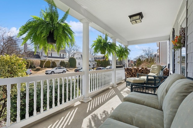 balcony featuring covered porch