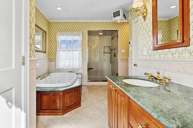 full bathroom featuring wainscoting, wallpapered walls, a shower stall, and ornamental molding