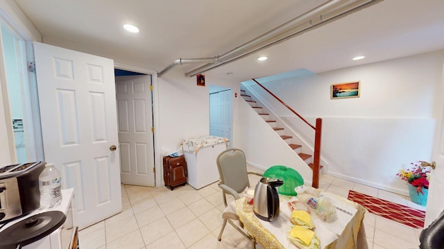 interior space featuring recessed lighting and light tile patterned flooring