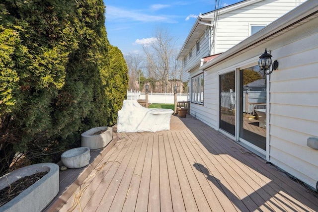 wooden deck featuring fence