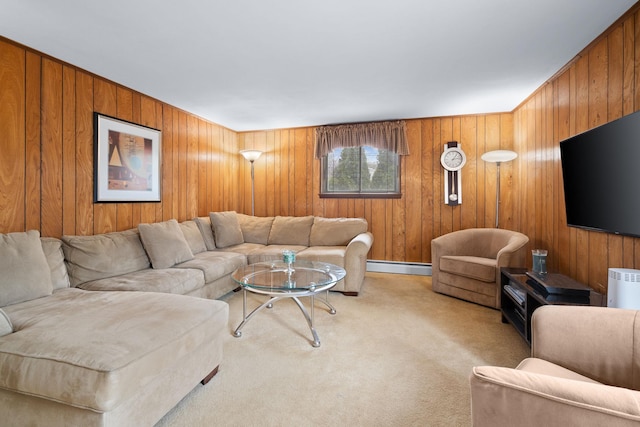 carpeted living room with baseboard heating and wood walls