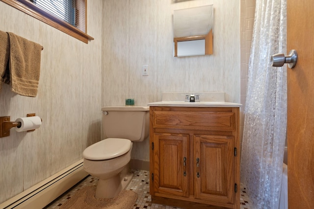 bathroom with toilet, a shower with shower curtain, baseboard heating, tile patterned floors, and vanity