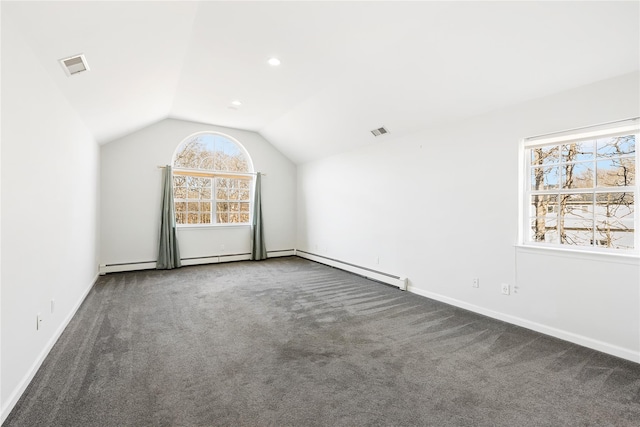 interior space featuring visible vents, carpet, and vaulted ceiling