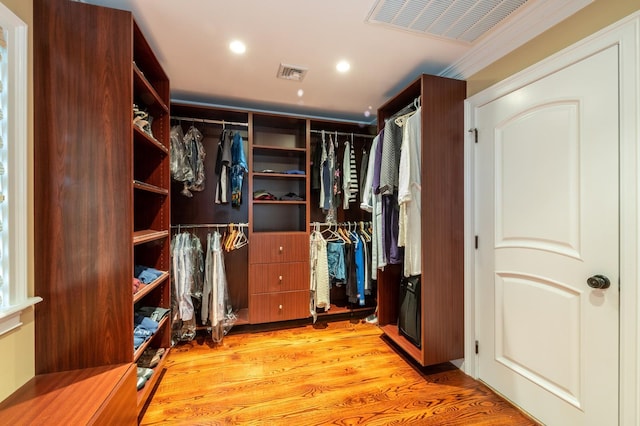 83 Ithaca Ave, Atlantic Beach, NY 11509 - spacious closet featuring light wood-style flooring and visible vents