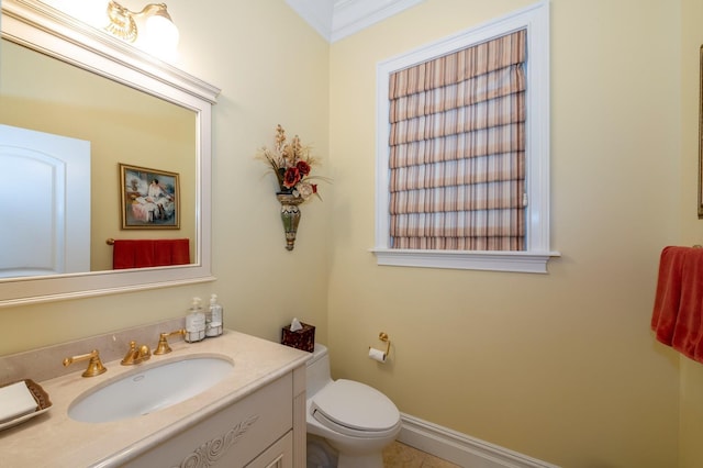 83 Ithaca Ave, Atlantic Beach, NY 11509 - bathroom featuring toilet, baseboards, and vanity