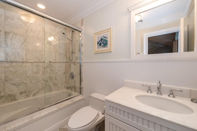 83 Ithaca Ave, Atlantic Beach, NY 11509 - full bath featuring crown molding, wainscoting, bath / shower combo with glass door, vanity, and toilet