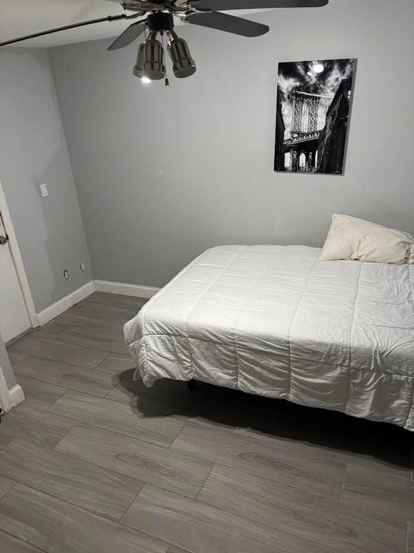 162-30 89th St, Howard Beach, NY 11414 - bedroom with baseboards and ceiling fan