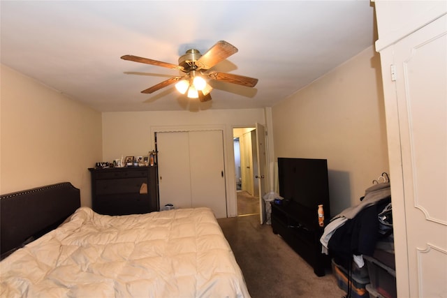 carpeted bedroom with a closet and a ceiling fan