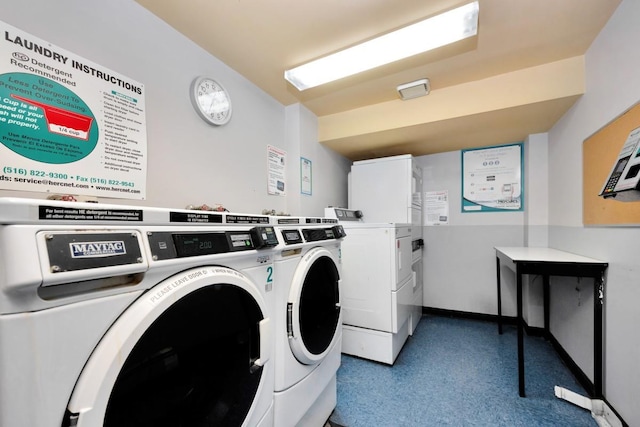 community laundry room with washing machine and dryer