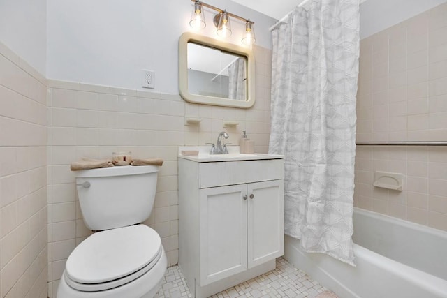 full bath with toilet, tile walls, shower / tub combo, tile patterned flooring, and vanity