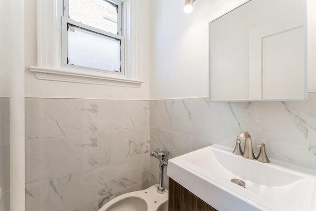 bathroom featuring tile walls and vanity