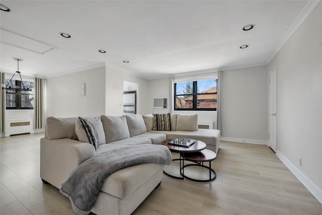 living area with light wood-style flooring, recessed lighting, baseboards, and ornamental molding