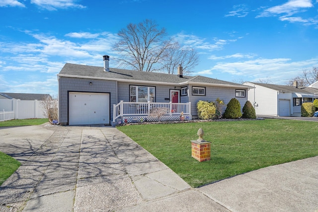 ranch-style home with driveway, fence, covered porch, a front yard, and a garage