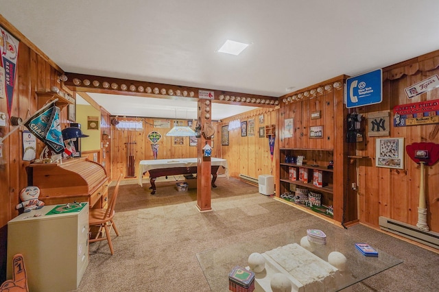 recreation room featuring carpet flooring, pool table, a baseboard heating unit, and wooden walls