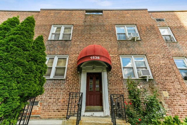 view of front of home with brick siding