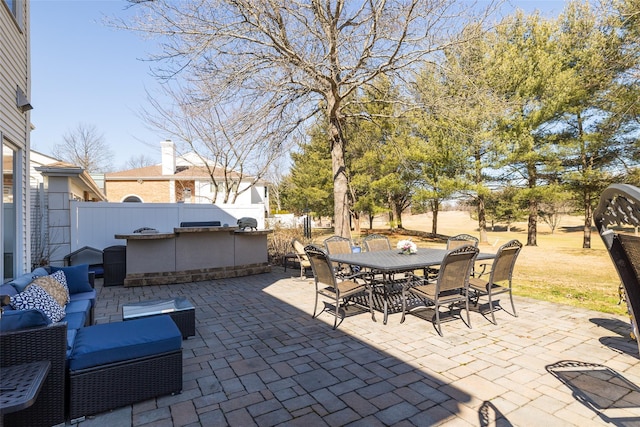 view of patio / terrace featuring a swimming pool, an outdoor hangout area, outdoor dining area, and fence