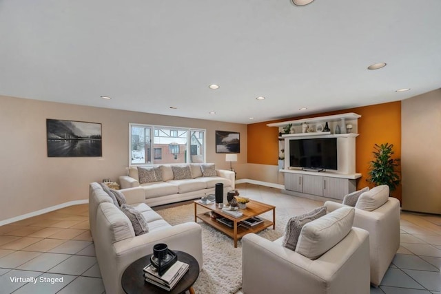 living area with recessed lighting, baseboards, and light tile patterned flooring