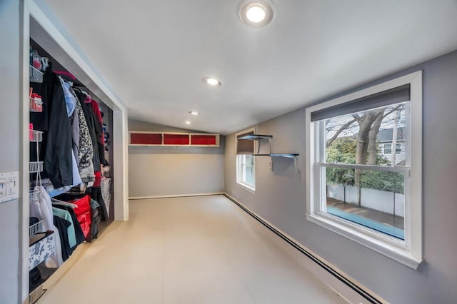 walk in closet featuring vaulted ceiling