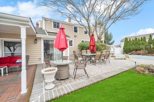 view of patio / terrace with fence