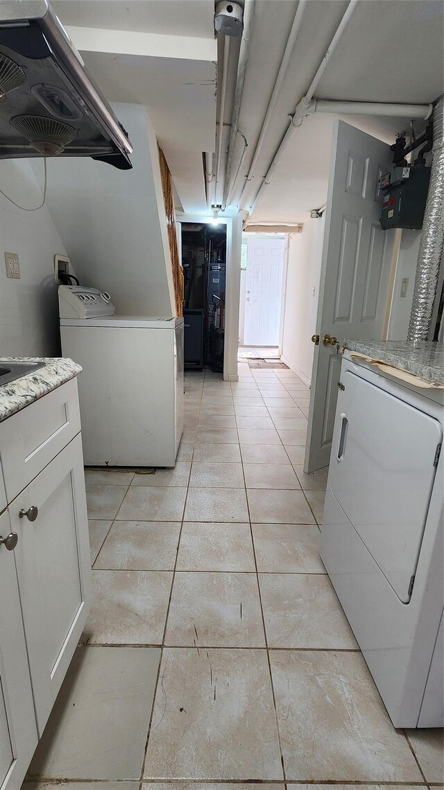149-03 Reeves Ave, Flushing, NY 11367 - laundry room featuring washer / clothes dryer and light tile patterned flooring