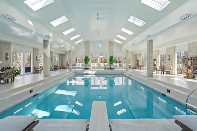 pool with a skylight and a diving board