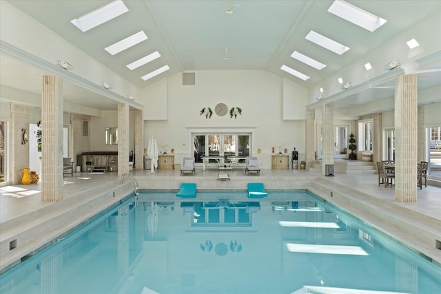 community pool featuring a skylight