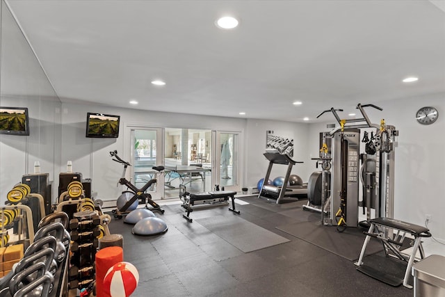 workout area featuring recessed lighting