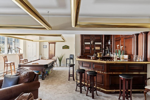 bar with pool table, crown molding, beamed ceiling, a dry bar, and light carpet