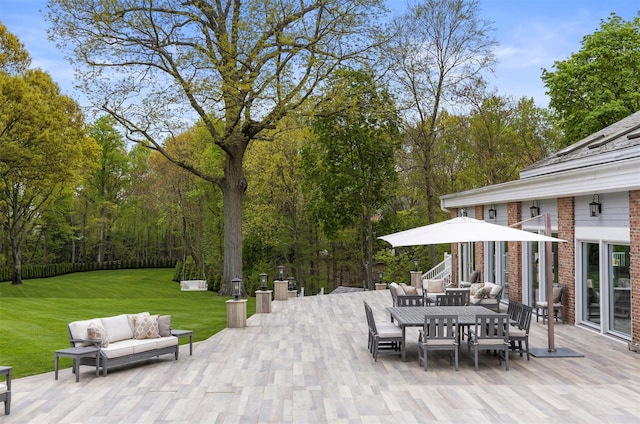 view of patio featuring an outdoor living space and outdoor dining area