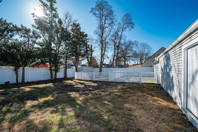 view of yard featuring a fenced backyard