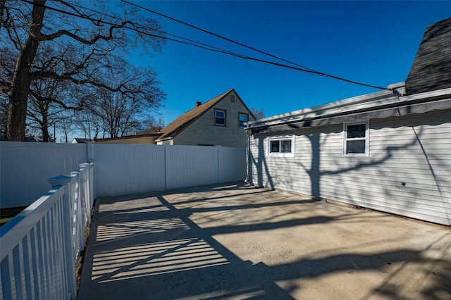 exterior space featuring a patio area and a fenced backyard