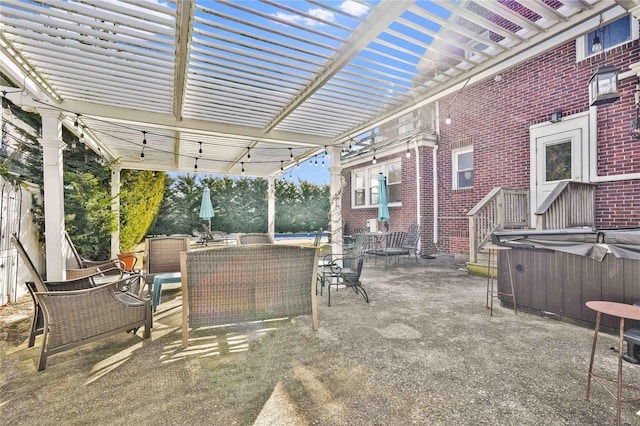 view of patio with outdoor dining area, a pergola, and a hot tub